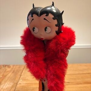 The Betty Boop Hats Off To Betty 2005 Collector Doll is a porcelain doll